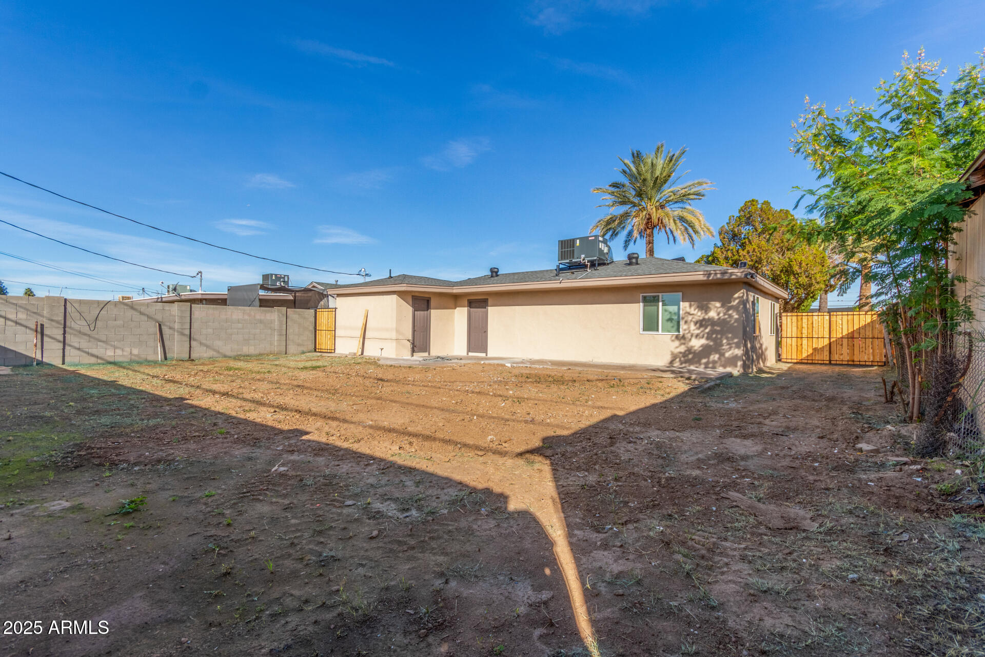 2749 West Montecito Avenue Phoenix, AZ 85017 - Photo 18 of 20 a front view of a house with a yard