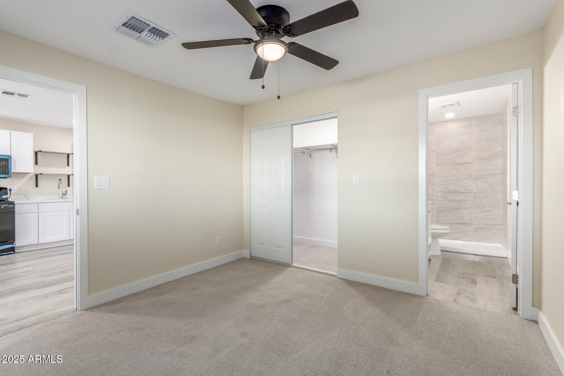 2749 West Montecito Avenue Phoenix, AZ 85017 - Photo 9 of 20 wooden floor in an empty room