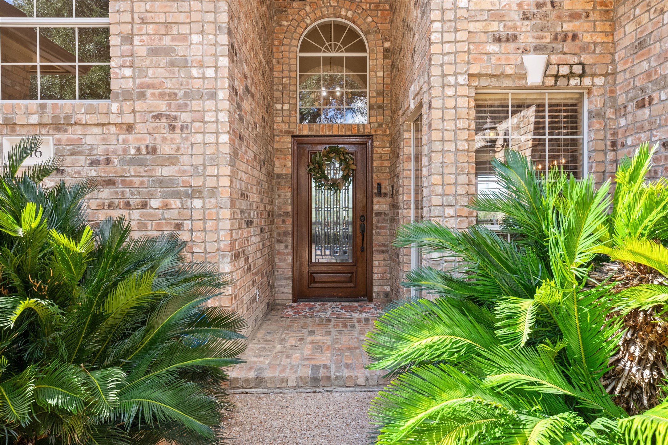 316 Lakefront Drive Point Venture, TX 78645 - Photo 25 of 40 a front view of a house with a yard