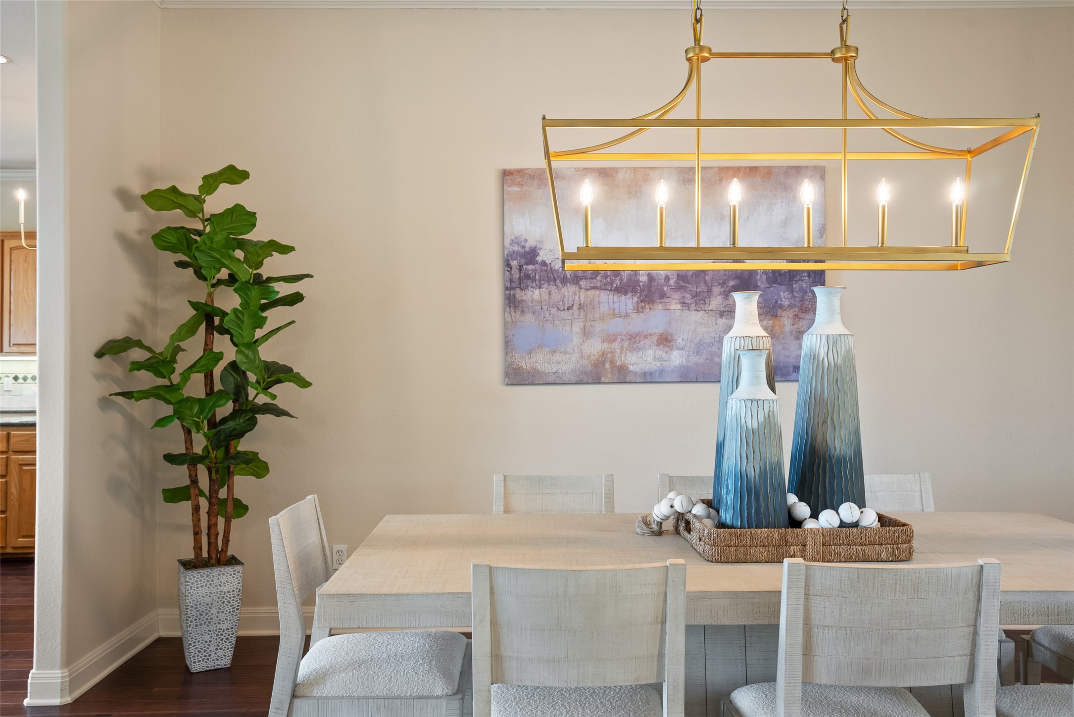 316 Lakefront Drive Point Venture, TX 78645 - Photo 4 of 40 a view of a dining room with furniture and wooden floor