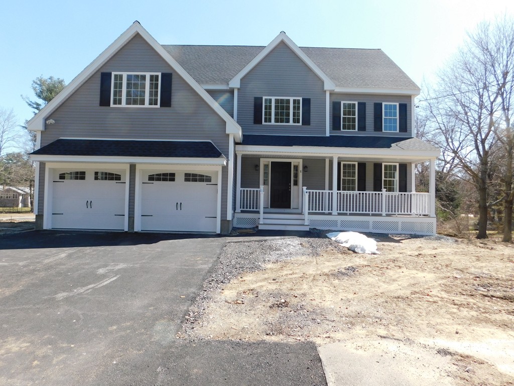 8 Anthony Road North Reading, MA 01864 - Photo 1 of 28 a front view of a house with a yard