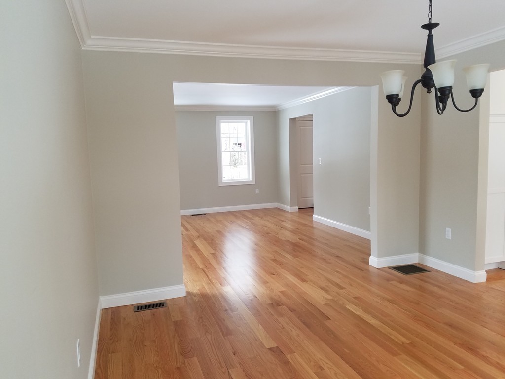 8 Anthony Road North Reading, MA 01864 - Photo 21 of 28 a view of a room with wooden floor and windows