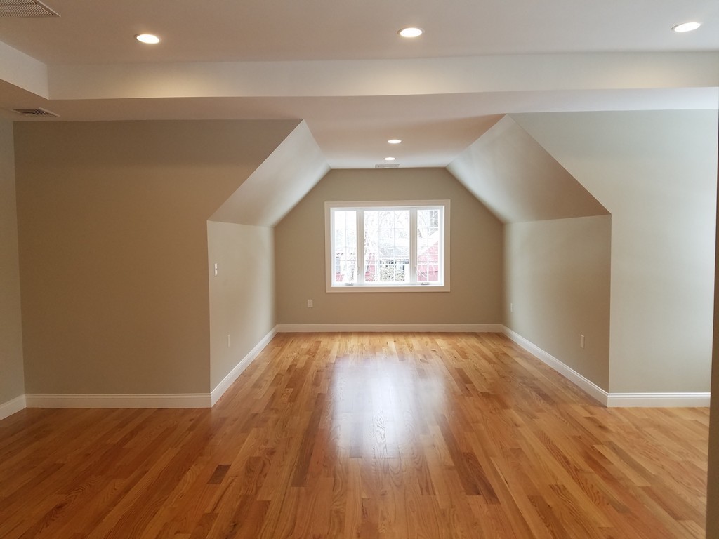 8 Anthony Road North Reading, MA 01864 - Photo 9 of 28 an empty room with wooden floor and windows