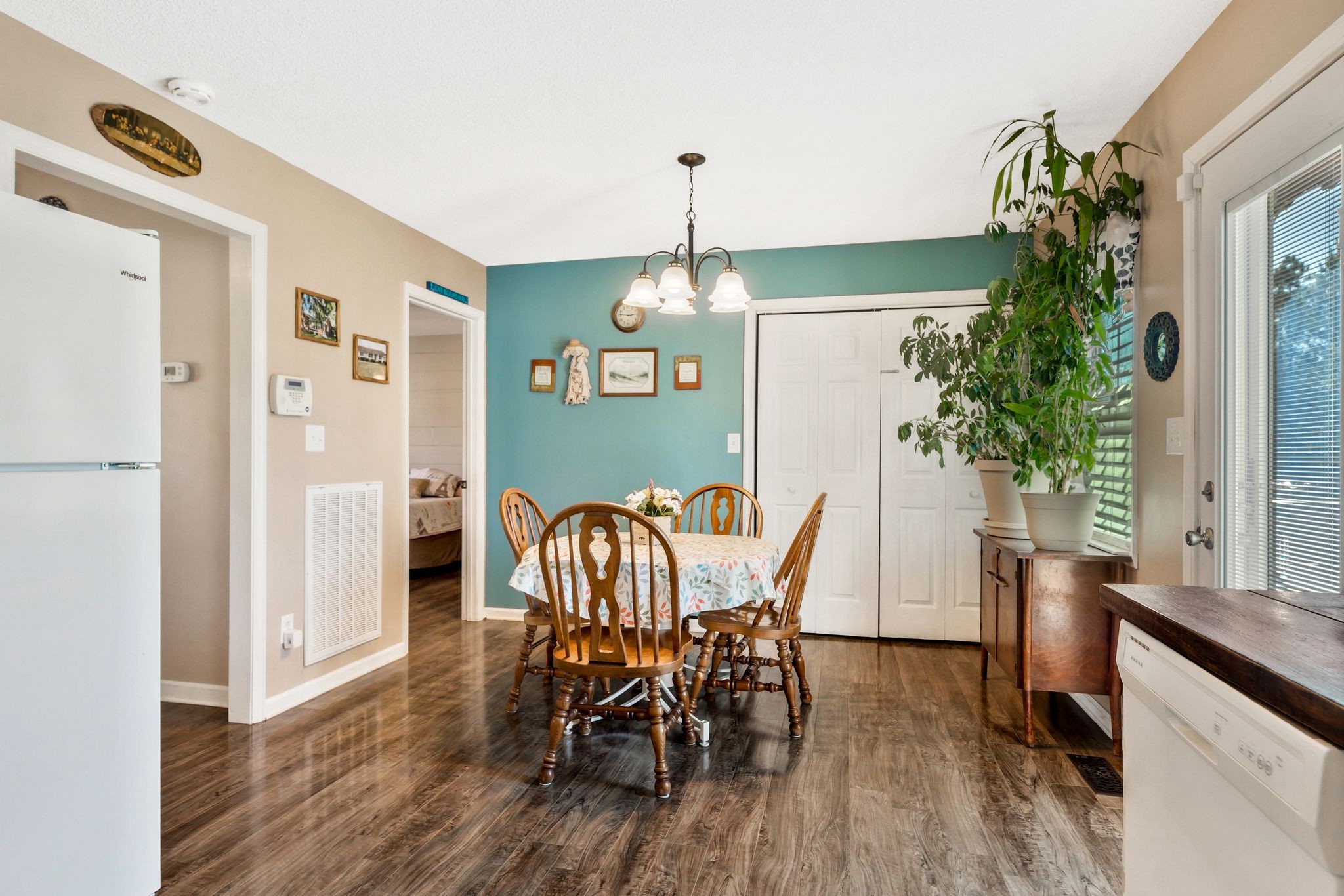 740 Happy Valley Road Bell Buckle, TN 37020 - Photo 16 of 33 a view of a dining room with furniture and window