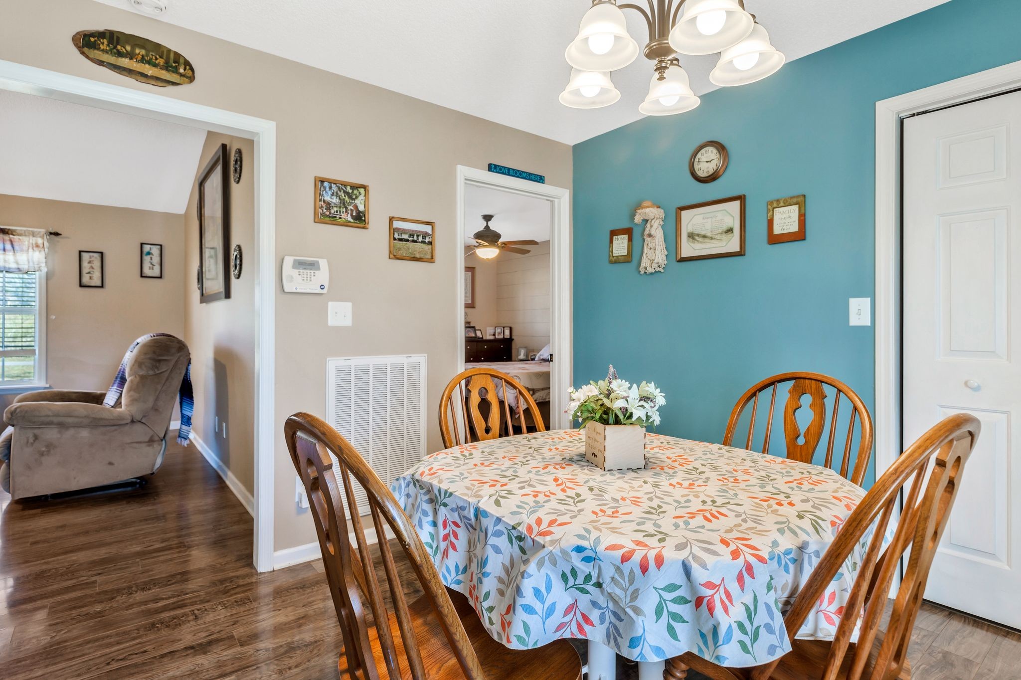 740 Happy Valley Road Bell Buckle, TN 37020 - Photo 17 of 33 a bedroom with furniture and wooden floor
