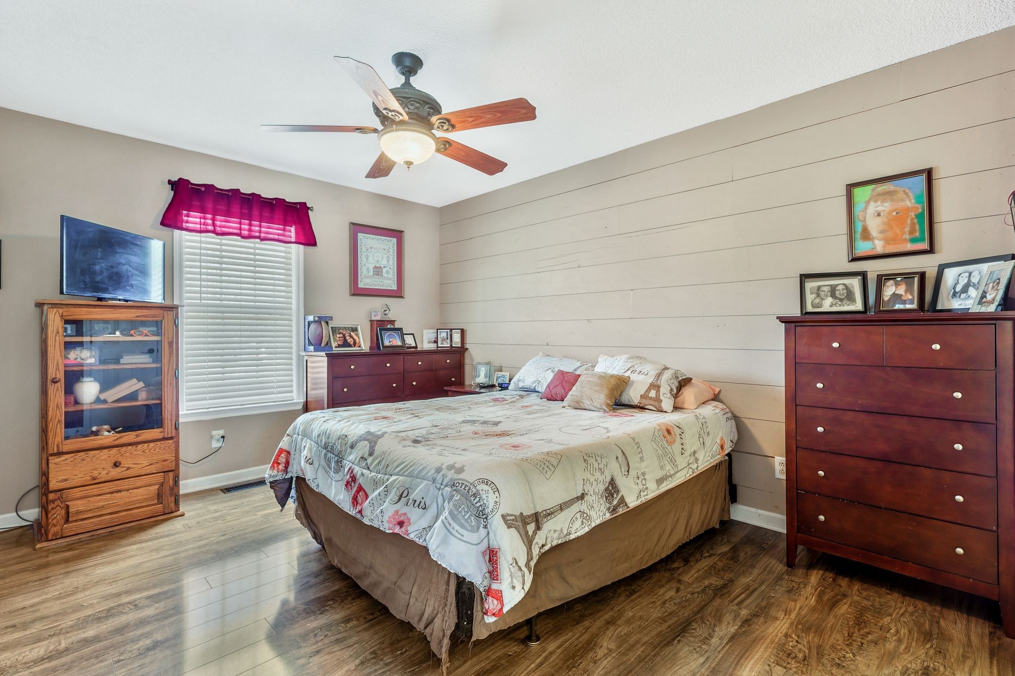 740 Happy Valley Road Bell Buckle, TN 37020 - Photo 18 of 33 a bedroom with a bed and dresser