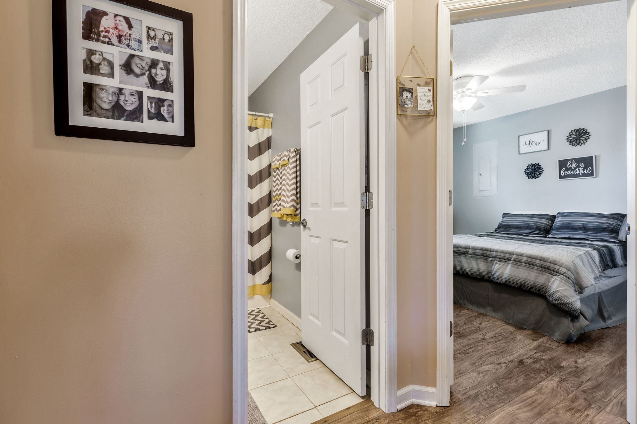 740 Happy Valley Road Bell Buckle, TN 37020 - Photo 21 of 33 a bedroom with a bed and a painting on the wall