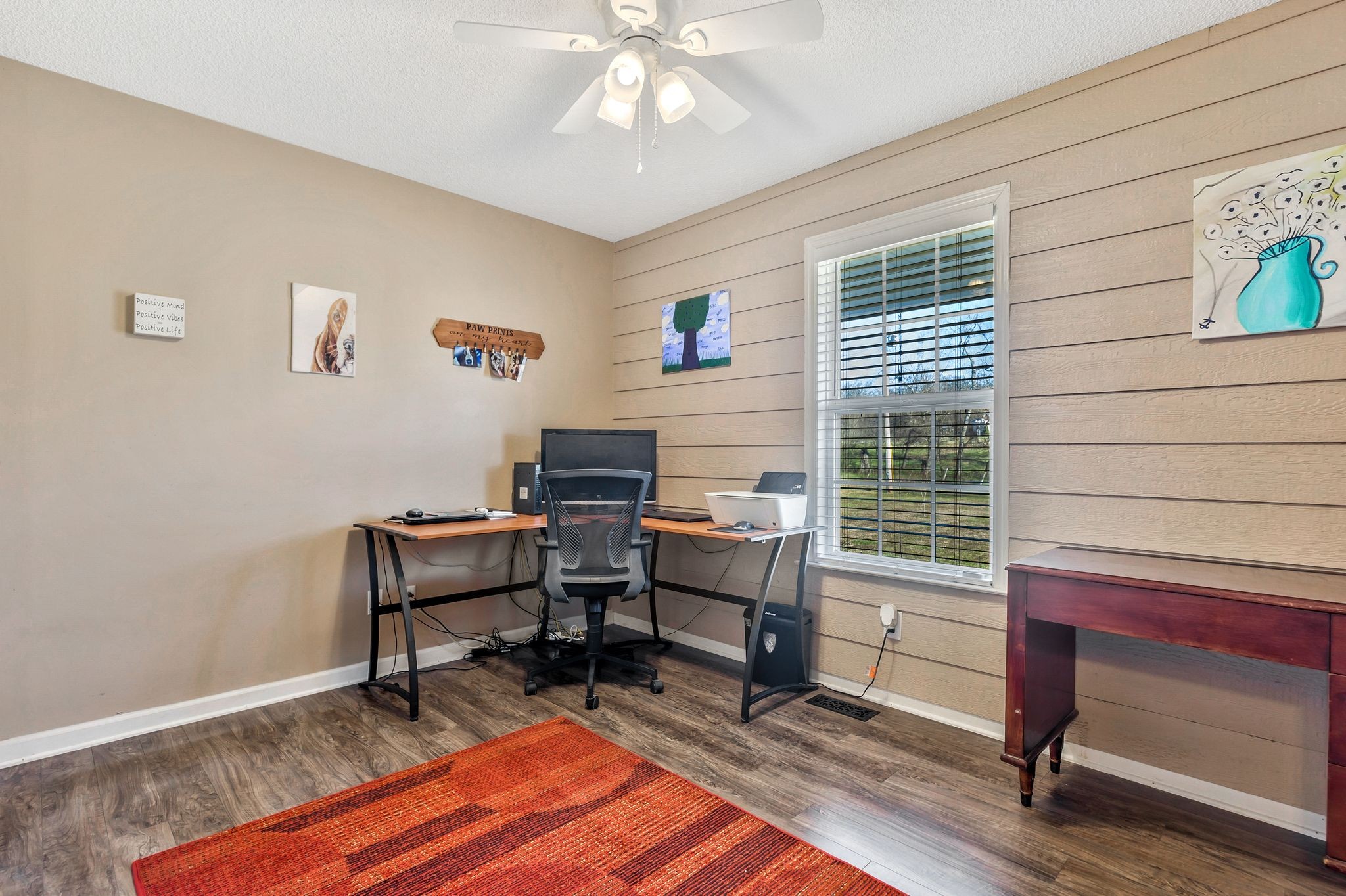 740 Happy Valley Road Bell Buckle, TN 37020 - Photo 25 of 33 a view of a workspace with furniture and a window