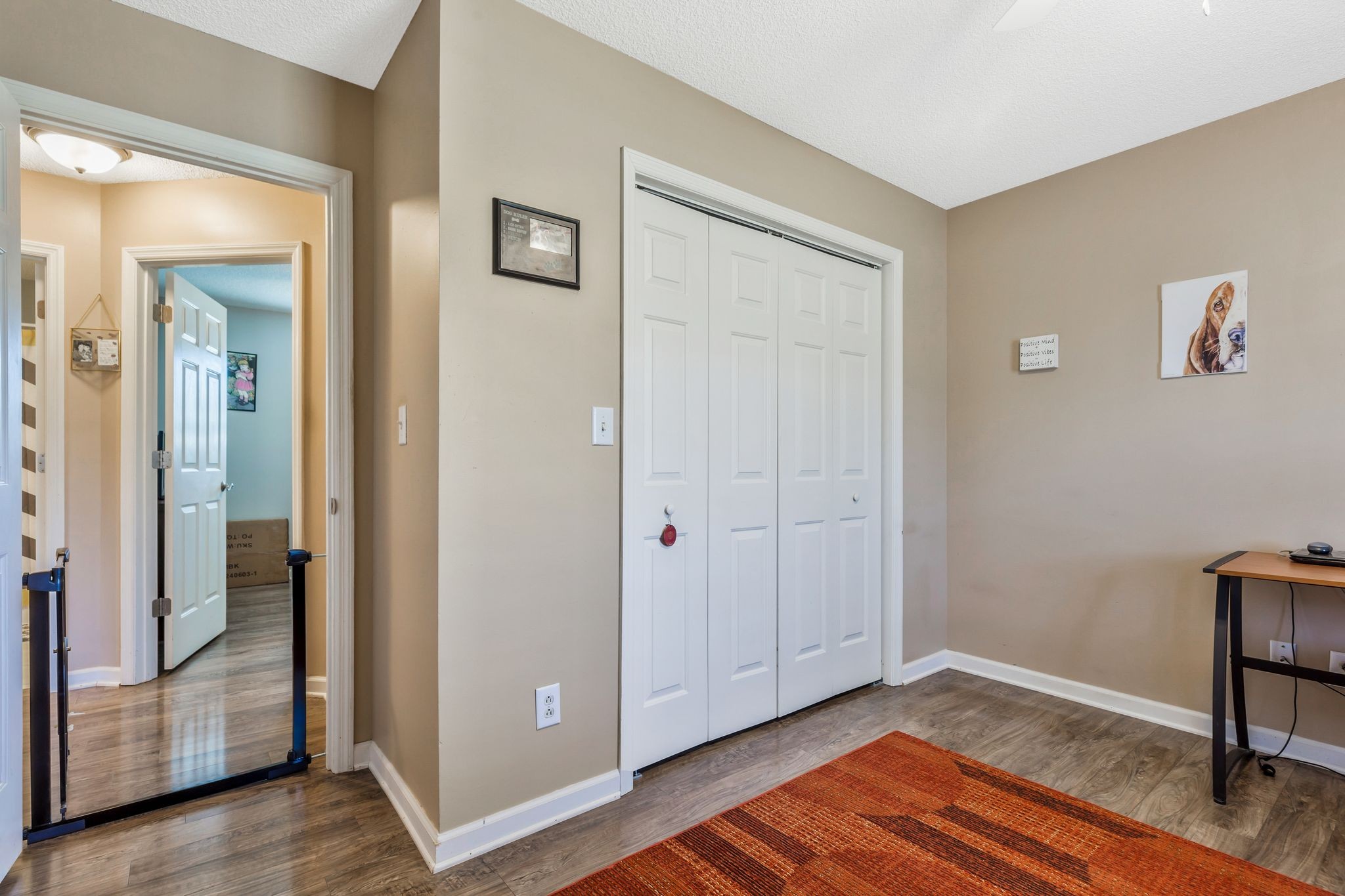 740 Happy Valley Road Bell Buckle, TN 37020 - Photo 26 of 33 a view of a livingroom with wooden floor and a hallway