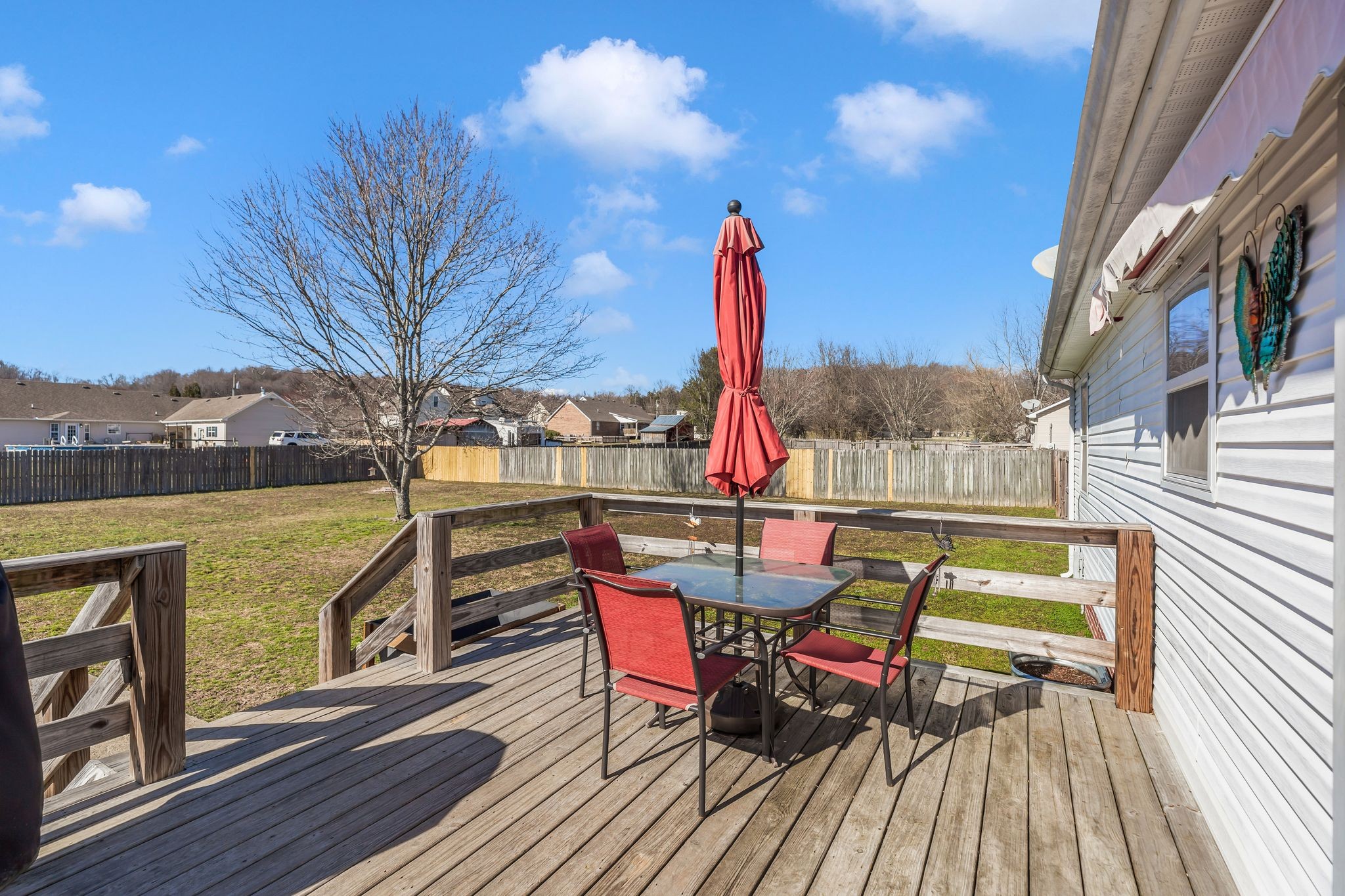 740 Happy Valley Road Bell Buckle, TN 37020 - Photo 27 of 33 a view of outdoor sitting area with furniture and wooden floor