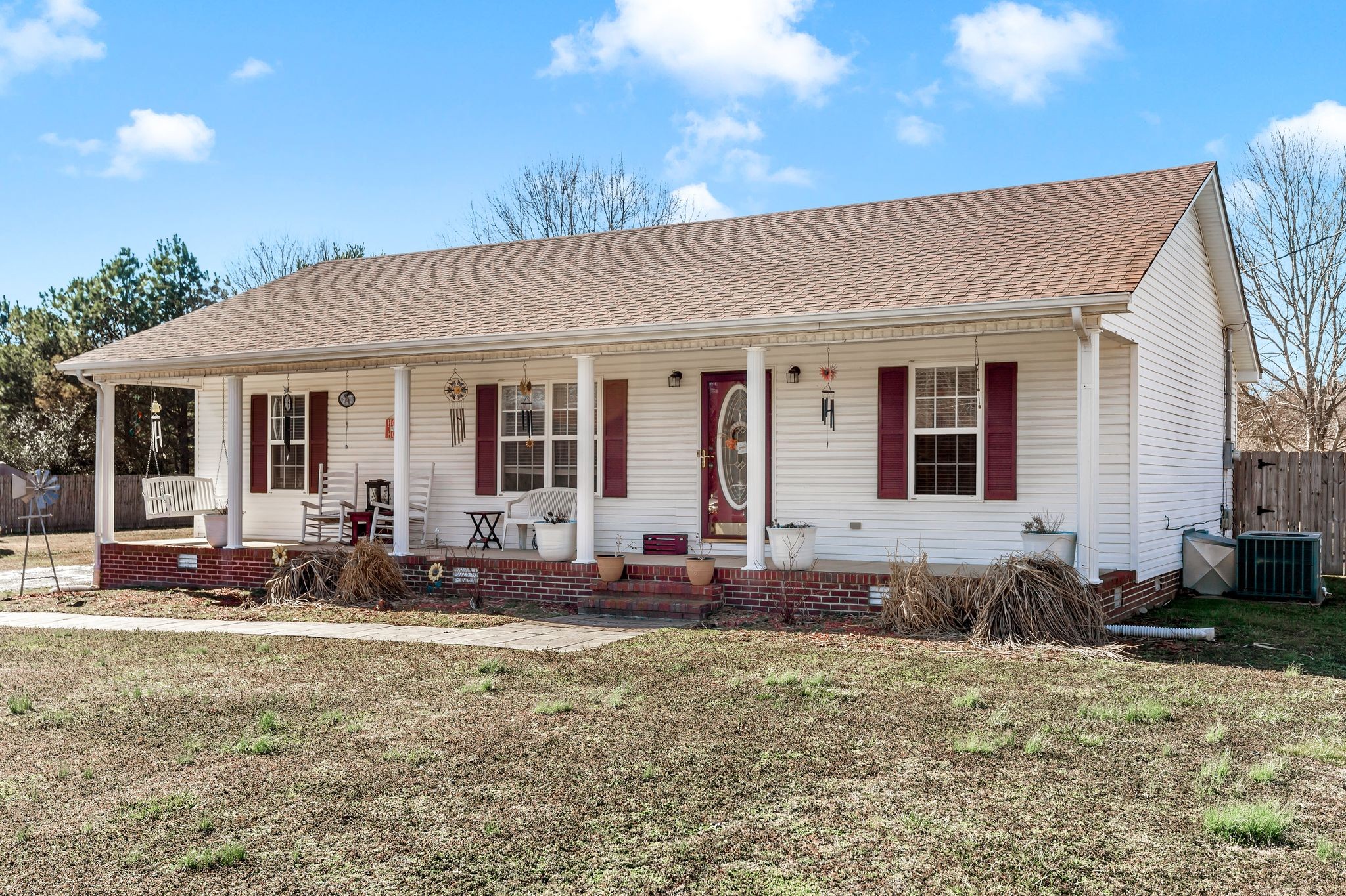 740 Happy Valley Road Bell Buckle, TN 37020 - Photo 4 of 33 a front view of a house with a patio