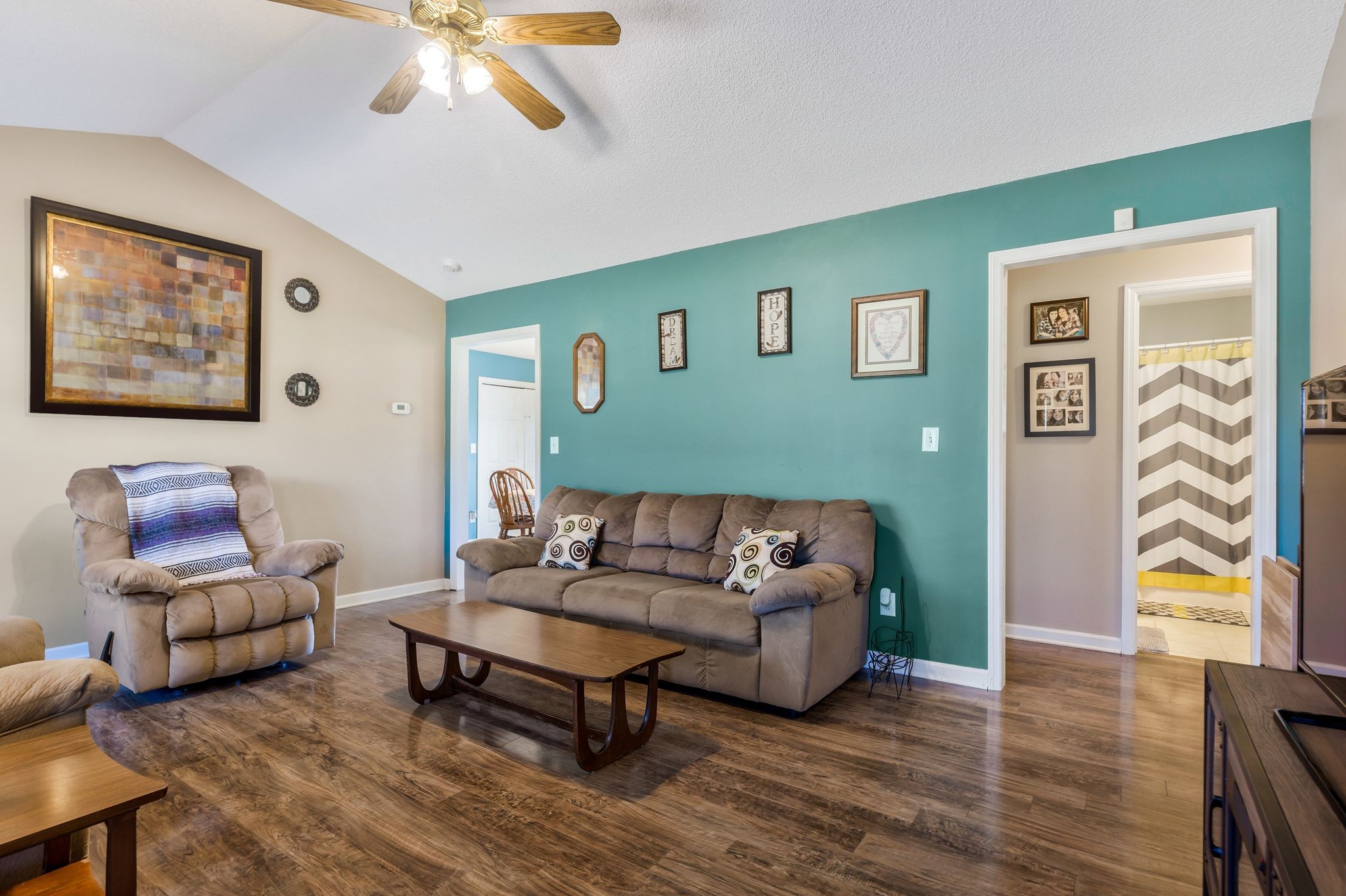 740 Happy Valley Road Bell Buckle, TN 37020 - Photo 7 of 33 a living room with furniture and a wooden floor