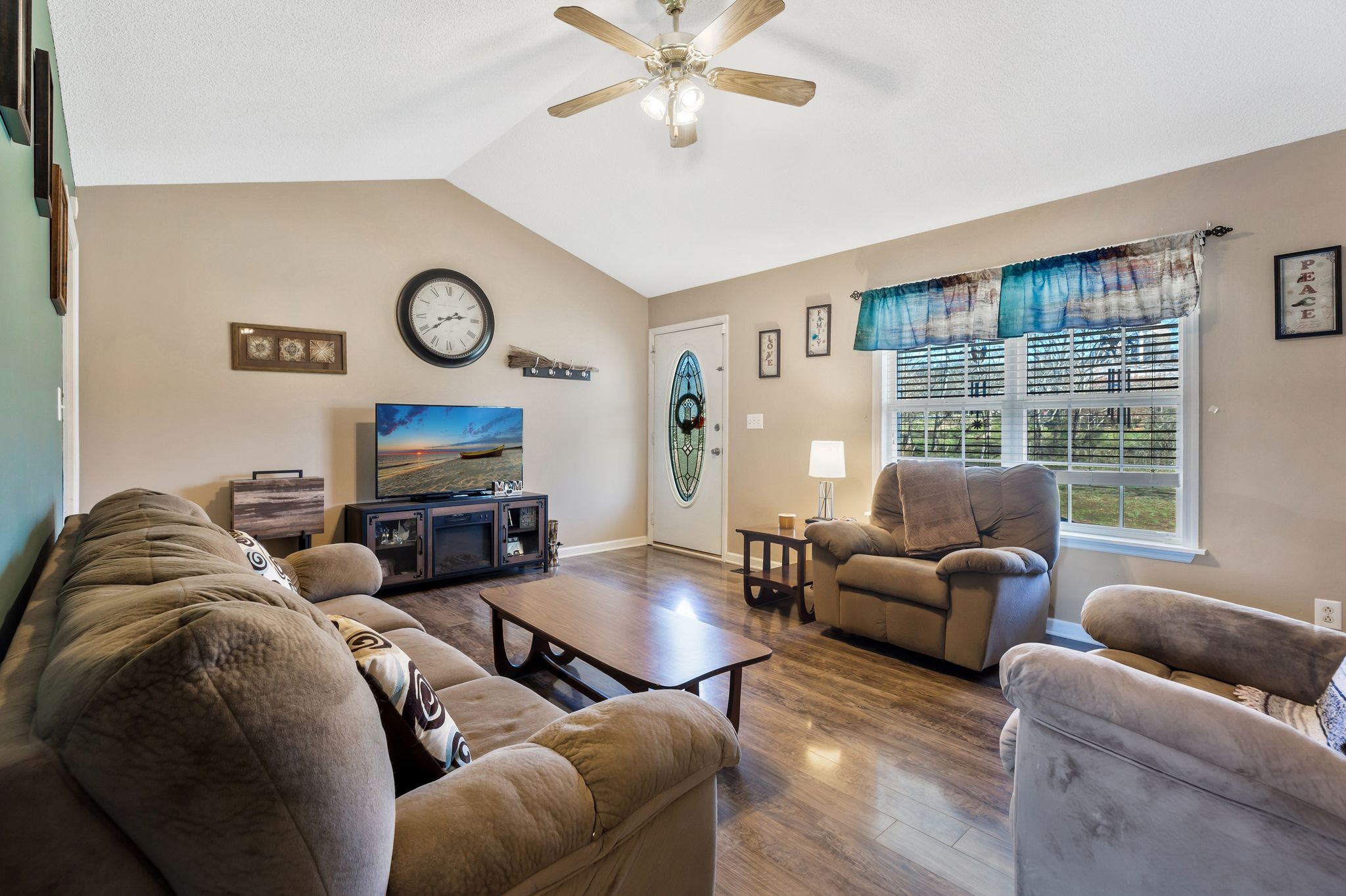 740 Happy Valley Road Bell Buckle, TN 37020 - Photo 10 of 33 a living room with furniture and a large window