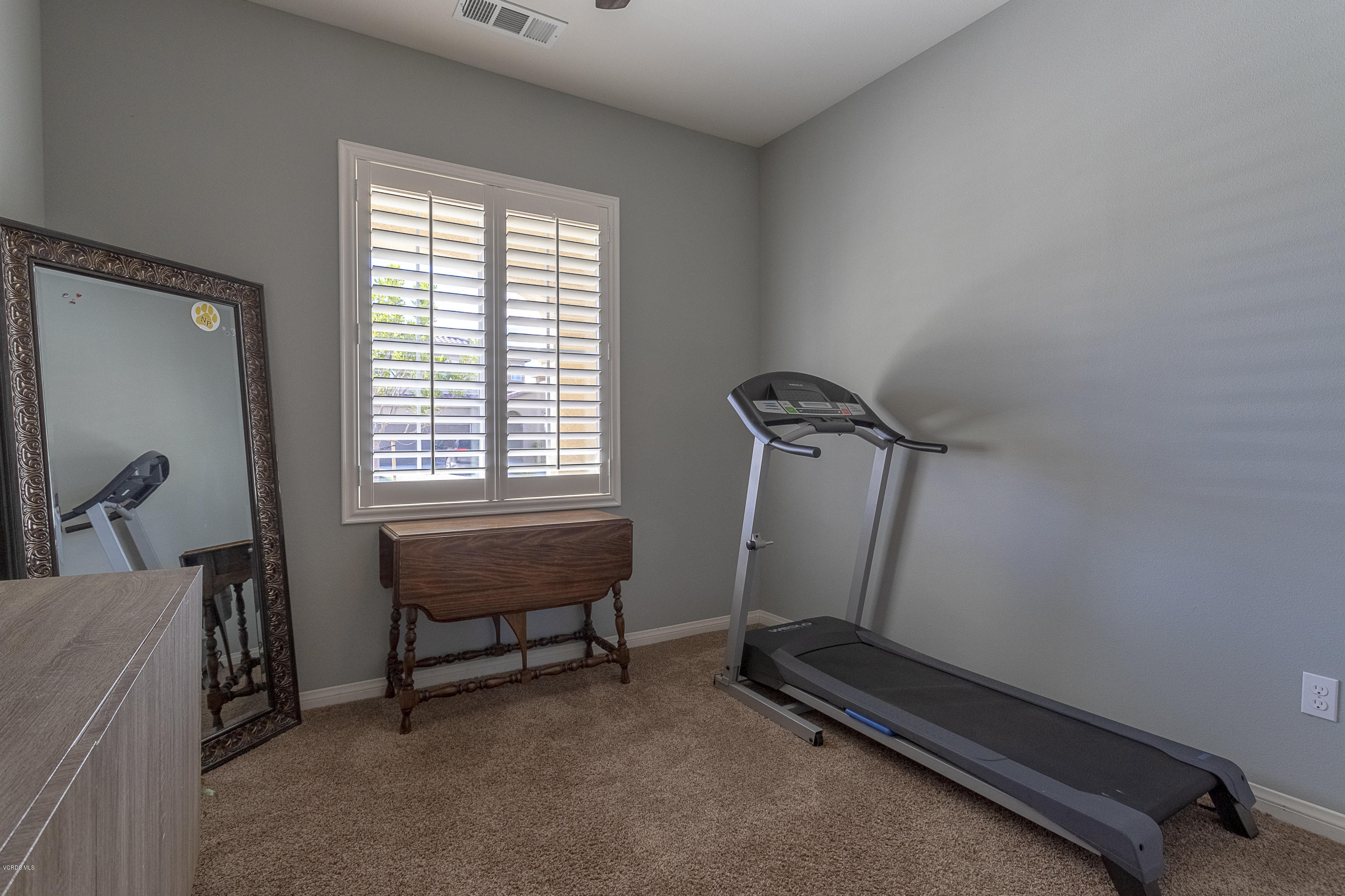 613 Xanadu Way Oxnard, CA 93036 - Photo 18 of 30 a view of a room with gym equipment