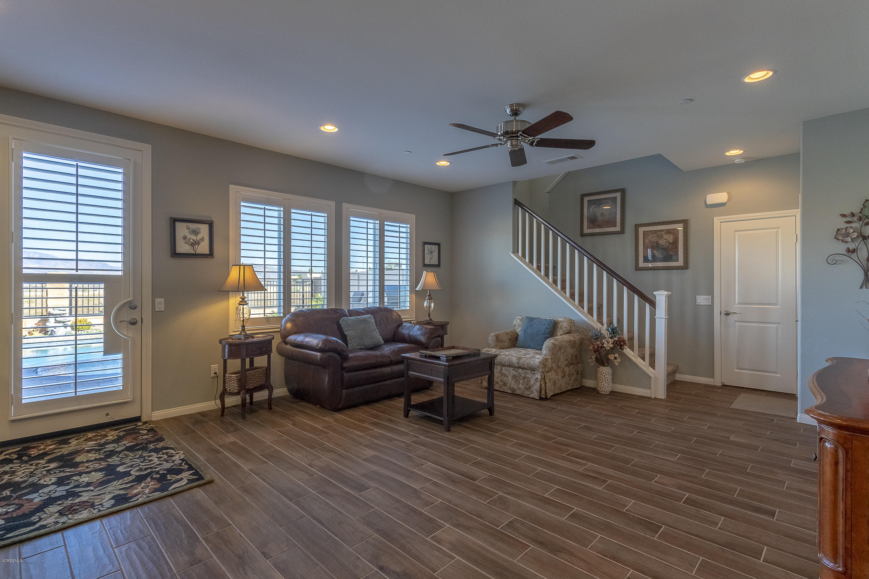 613 Xanadu Way Oxnard, CA 93036 - Photo 3 of 30 a living room with furniture and wooden floor