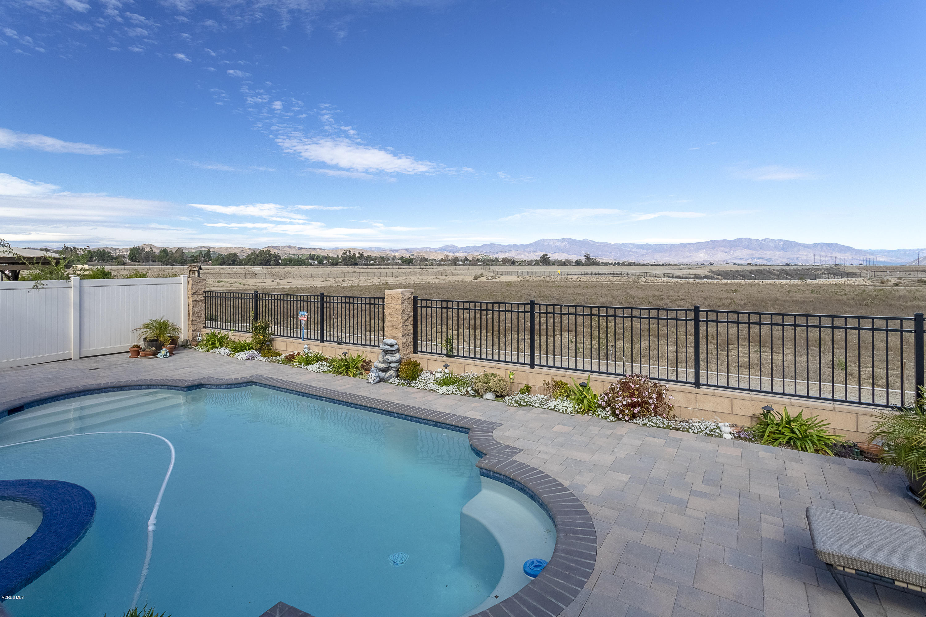 613 Xanadu Way Oxnard, CA 93036 - Photo 24 of 30 a view of a swimming pool with a terrace