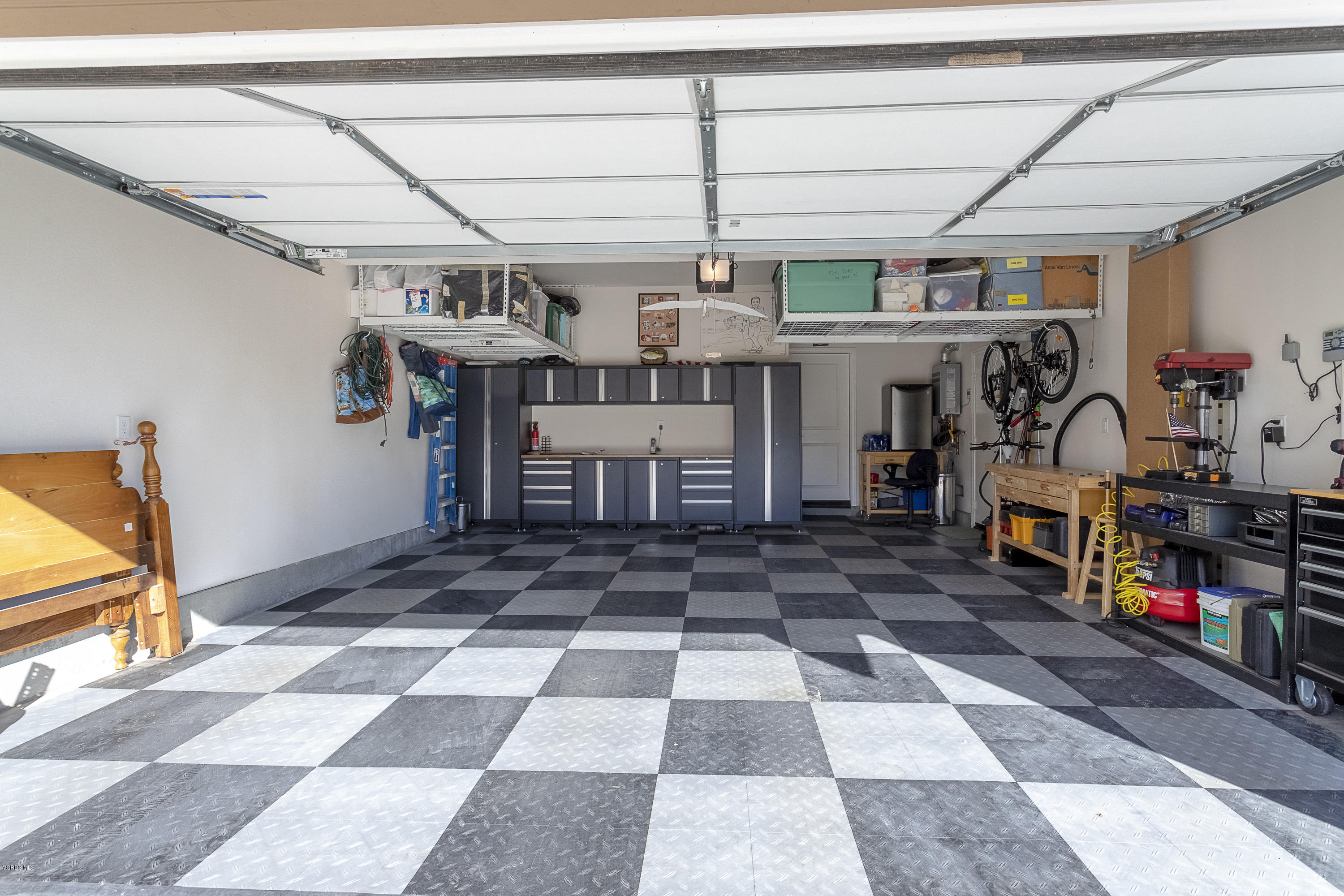 613 Xanadu Way Oxnard, CA 93036 - Photo 25 of 30 a view of a room with lots of windows and plants