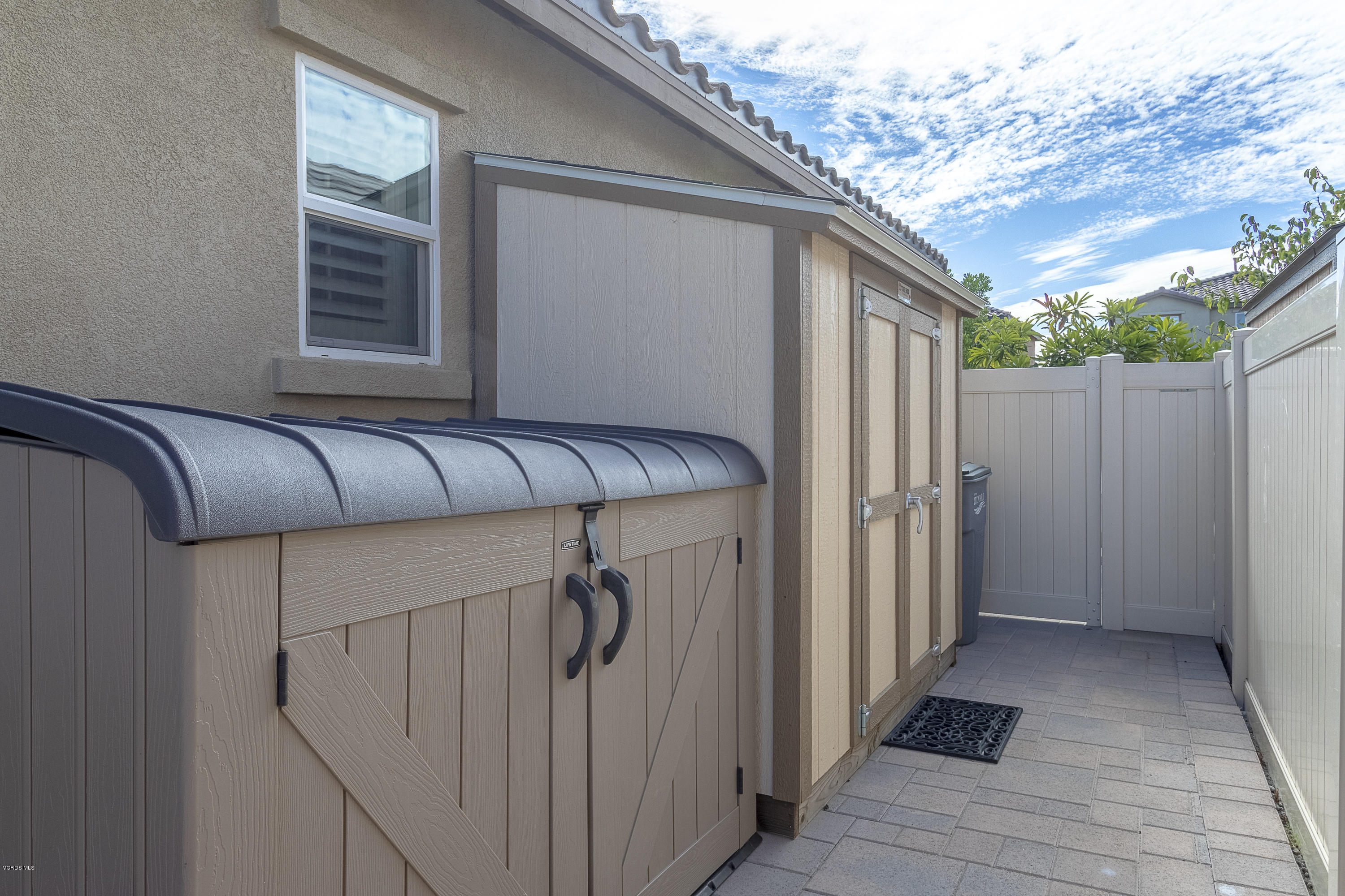 613 Xanadu Way Oxnard, CA 93036 - Photo 26 of 30 a view of a balcony with wooden walls and stairs