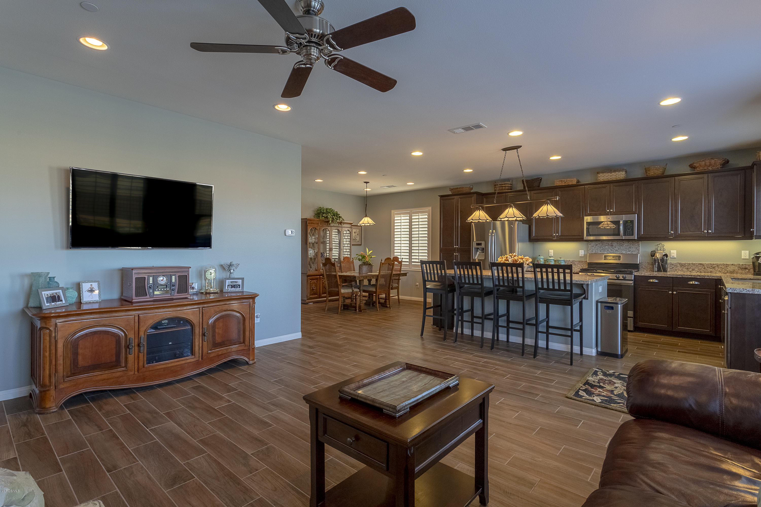 613 Xanadu Way Oxnard, CA 93036 - Photo 4 of 30 a living room with furniture and a flat screen tv