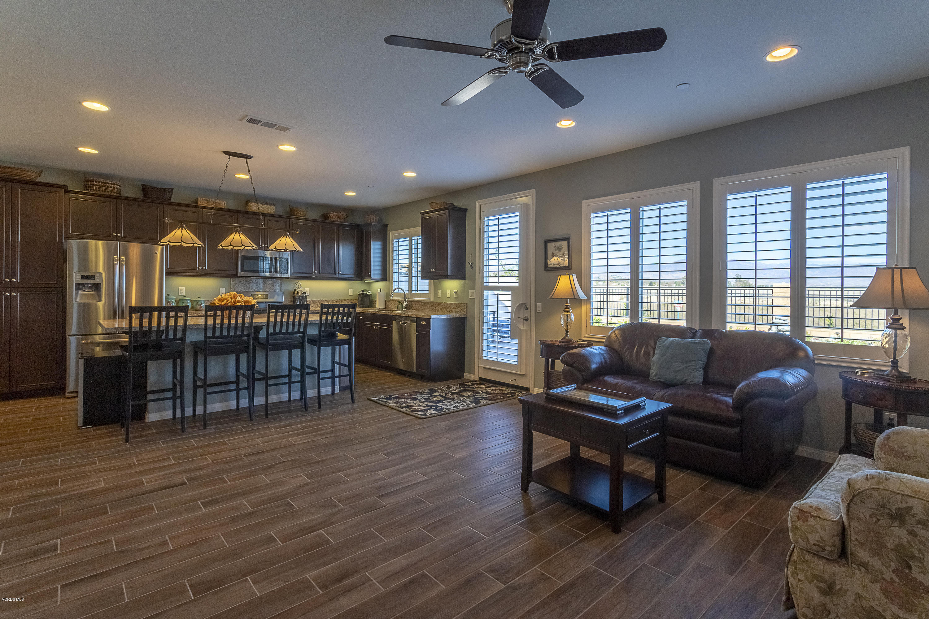 613 Xanadu Way Oxnard, CA 93036 - Photo 5 of 30 a living room with furniture and a wooden floor
