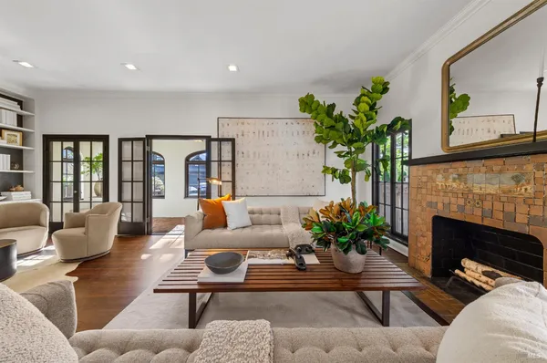 a view of a house with outdoor seating space