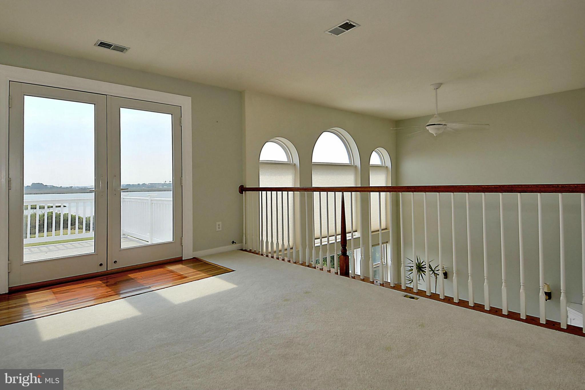 1001 Long Point Road Grasonville, MD 21638 - Photo 13 of 29 a view of an empty room with a window