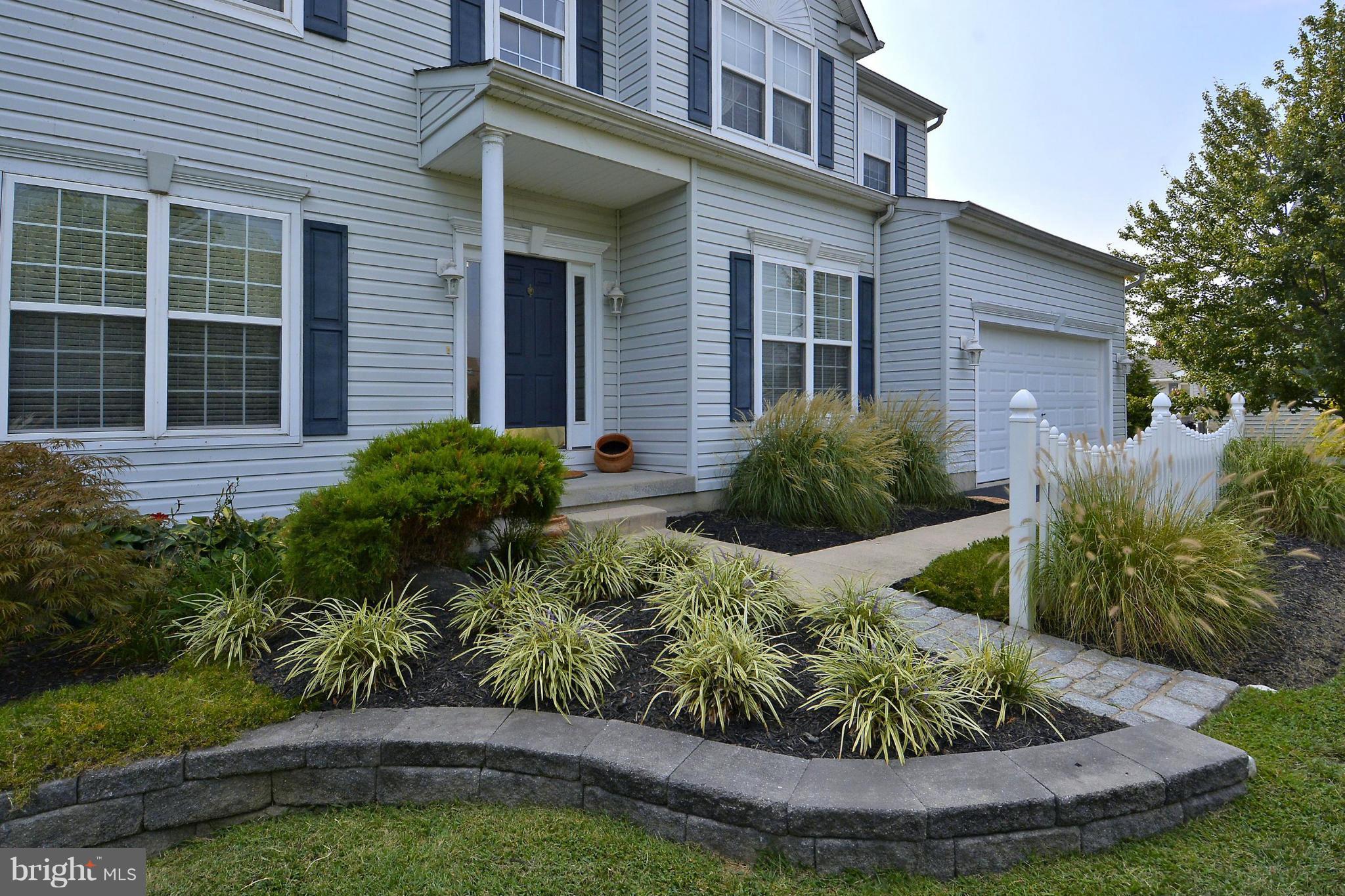 1001 Long Point Road Grasonville, MD 21638 - Photo 3 of 29 a view of a house with a garden