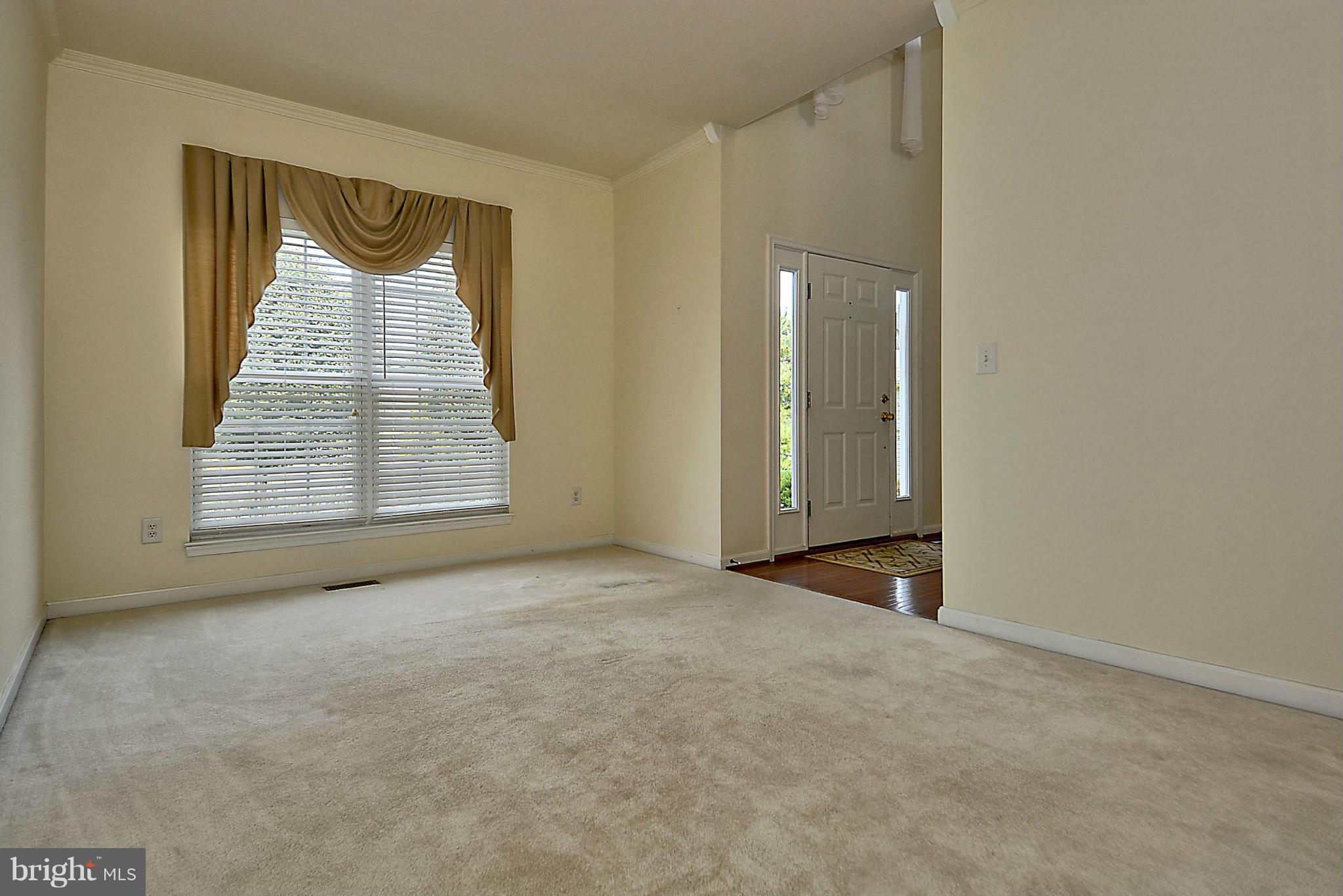 1001 Long Point Road Grasonville, MD 21638 - Photo 4 of 29 an empty room with windows and closet