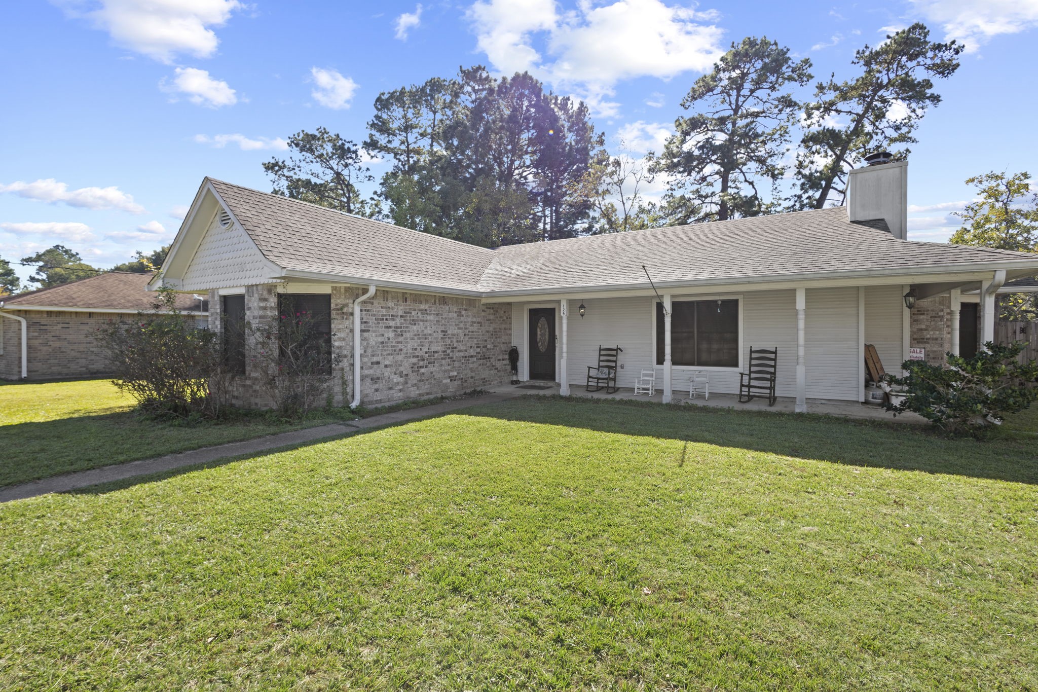 125 Williams Road Lumberton, TX 77657 - Photo 3 of 22 a front view of a house with garden