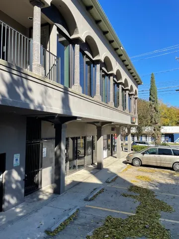 a front view of a building with street