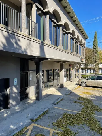 a front view of a building with street