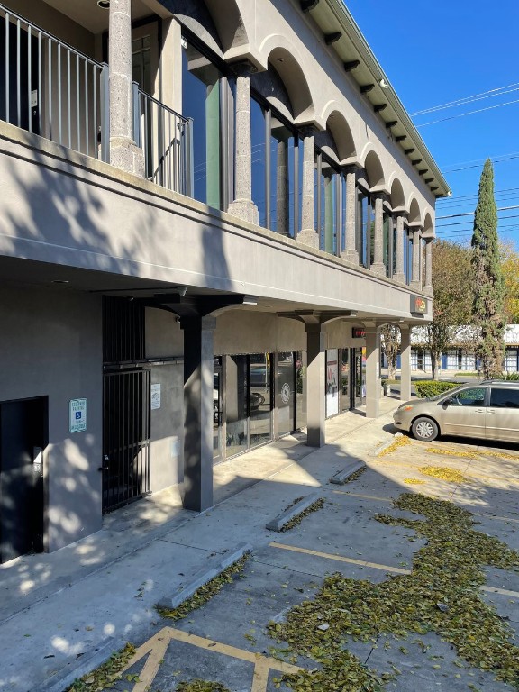 1529 Barton Springs Road, Unit 31 Austin, TX 78704 - Photo 16 of 21 a front view of a building with street