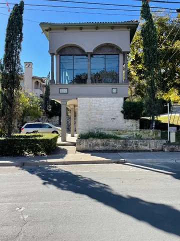 a view of a car parked on the side of the road