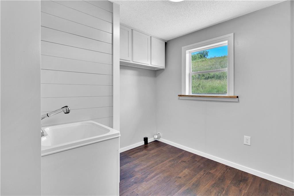 910 Dunn Station Road Prosperity, PA 15329 - Photo 23 of 43 a bathroom with a sink and a vanity
