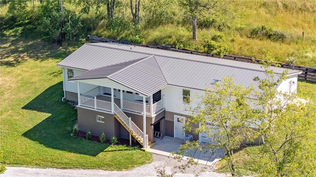 910 Dunn Station Road Prosperity, PA 15329 - Photo 38 of 43 a aerial view of a house with a yard