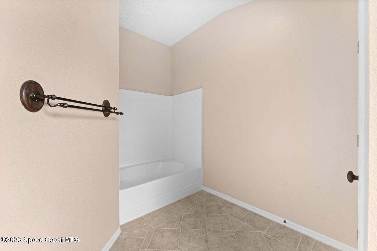 4741 Decatur Circle Melbourne, FL 32934 - Photo 20 of 44 a bathroom with a shower