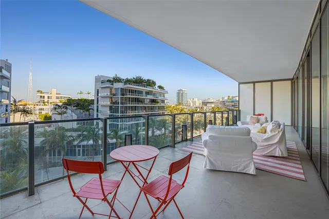 a bedroom with a bed and a view of bathroom