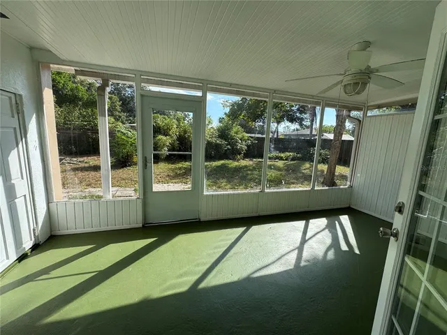 a view of a porch in a backyard