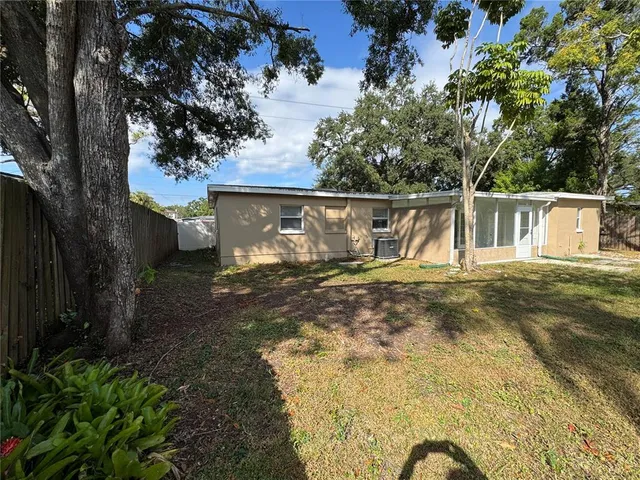 a view of swimming pool with a backyard