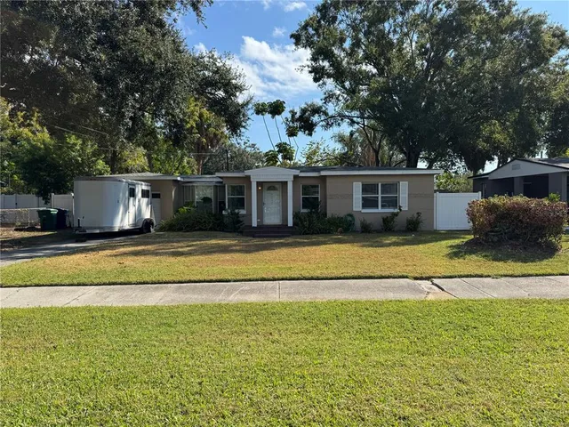 a view of a house with a swimming pool