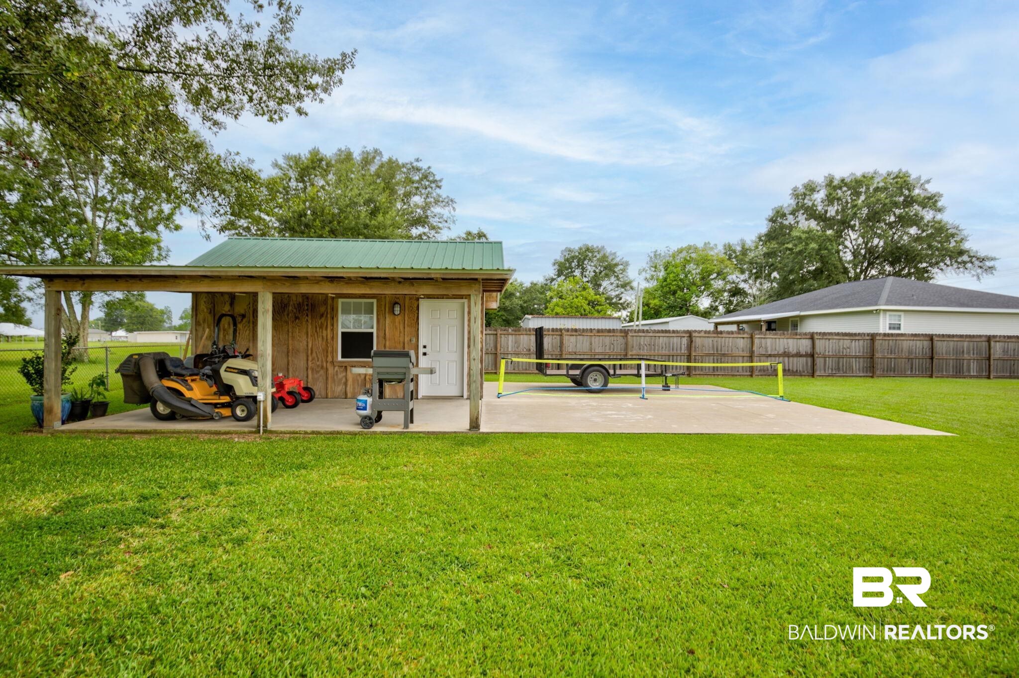 18732 Fairground Road Robertsdale, AL 36567 - Photo 43 of 46 View of yard featuring a patio