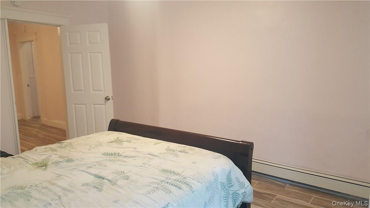 14-16 Horton Avenue, Unit 1 New Rochelle, NY 10801 - Photo 11 of 25 a bedroom with a bed and a rug