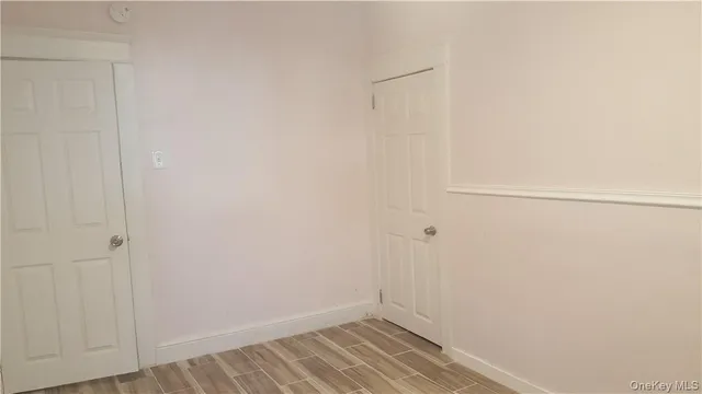 a bathroom with a toilet and shower