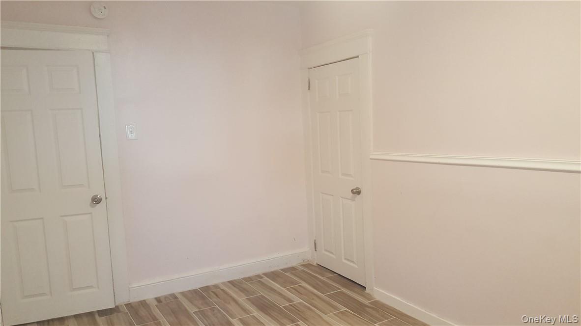 14-16 Horton Avenue, Unit 1 New Rochelle, NY 10801 - Photo 12 of 25 a view of small space with empty racks