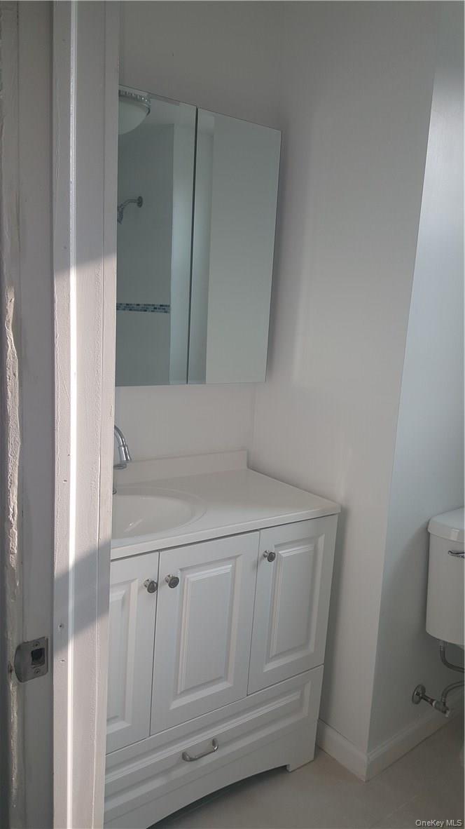 14-16 Horton Avenue, Unit 1 New Rochelle, NY 10801 - Photo 15 of 25 a bathroom with a sink