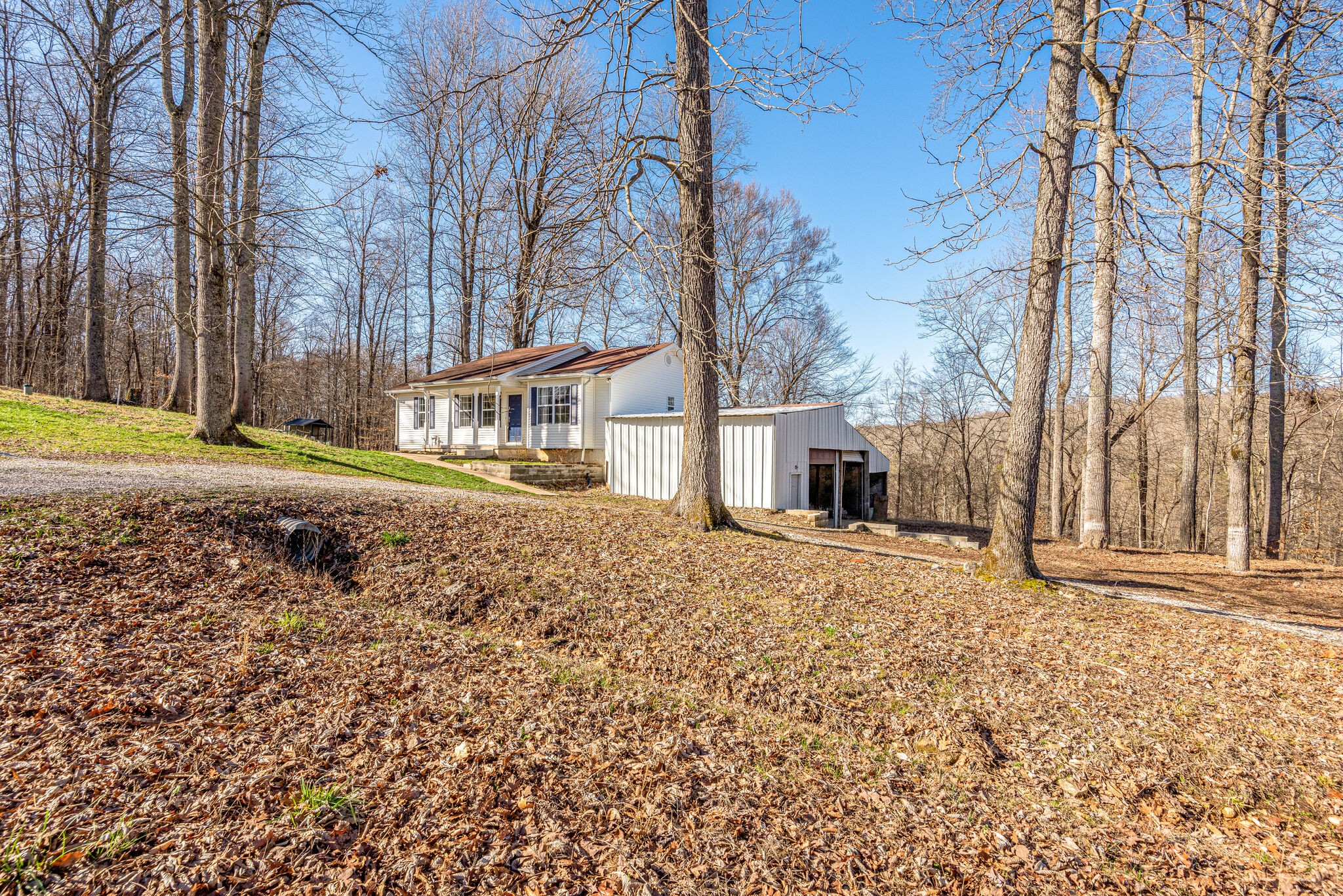 1121 Deer Ridge Road Kingston Springs, TN 37082 - Photo 1 of 27 a view of a house with a yard and pathway