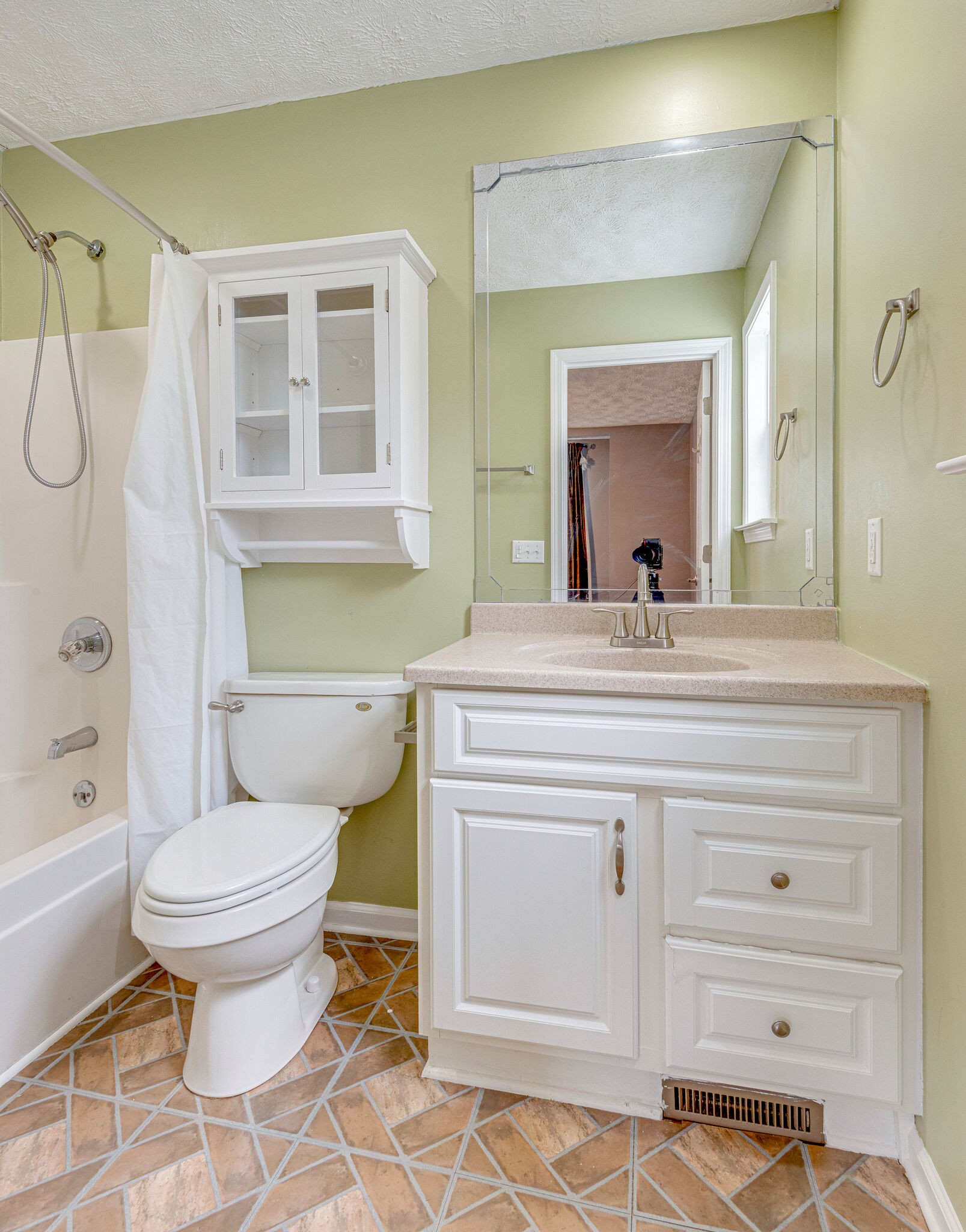 1121 Deer Ridge Road Kingston Springs, TN 37082 - Photo 15 of 27 a bathroom with a sink toilet and shower
