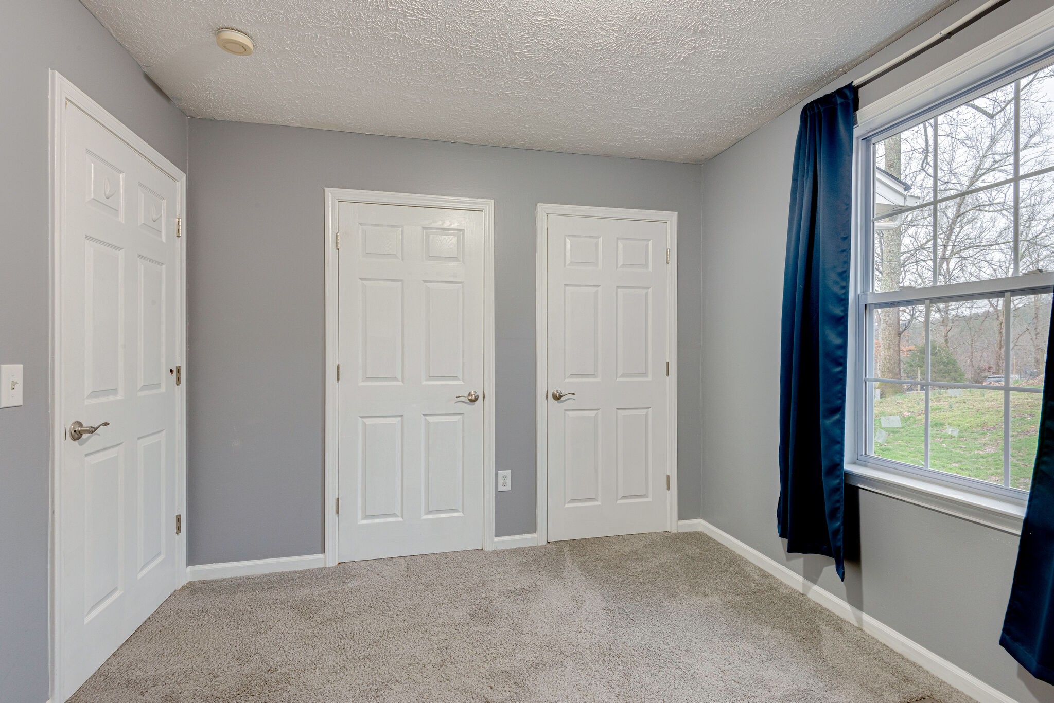 1121 Deer Ridge Road Kingston Springs, TN 37082 - Photo 18 of 27 a view of an empty room with a window