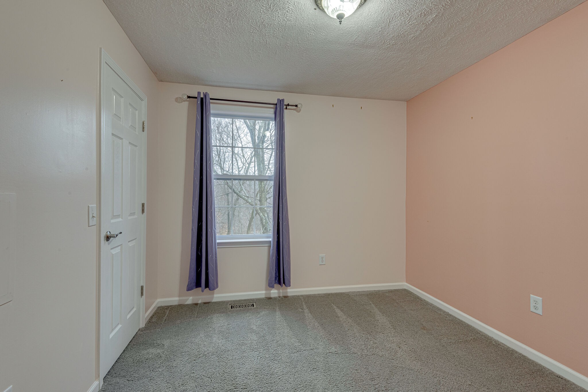 1121 Deer Ridge Road Kingston Springs, TN 37082 - Photo 19 of 27 an empty room with a window