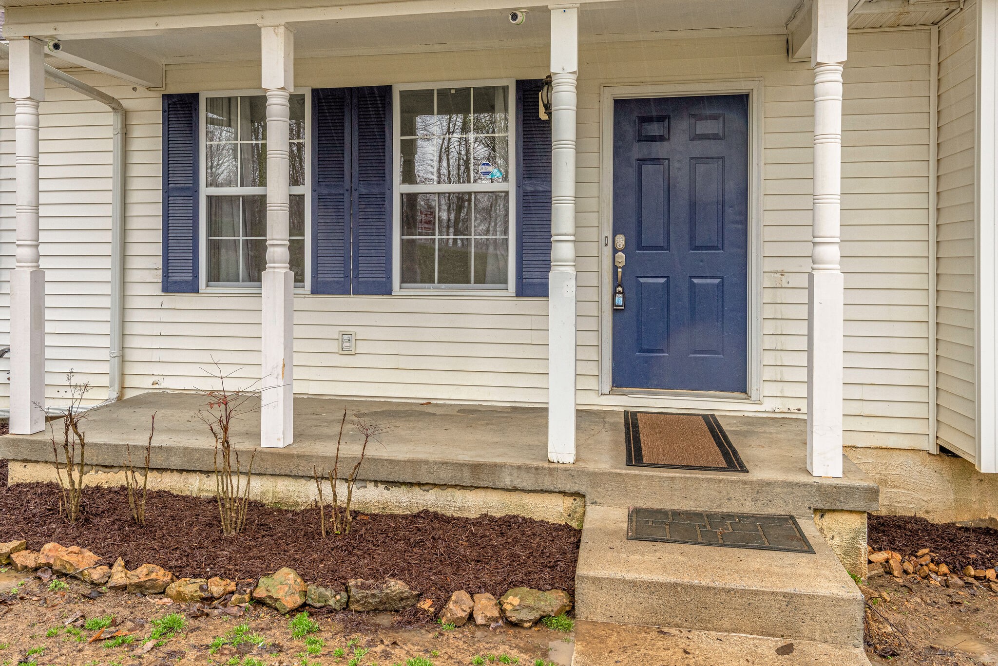 1121 Deer Ridge Road Kingston Springs, TN 37082 - Photo 4 of 27 a view of a brick house with many windows